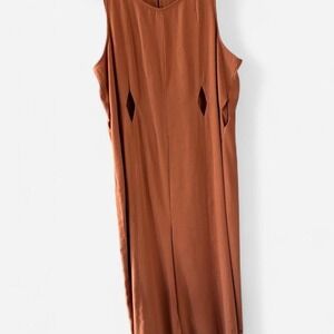 BCBG Generation orange jumpsuit with diamond bodice cutouts Size M